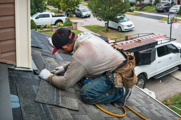 Professional Gutter Installation technician working in Guston, KY